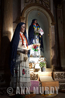Saints wearing indigenous clothing