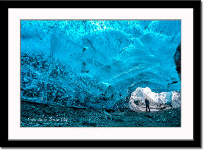 At the entrance of ice cave of Vatnajkull glacier