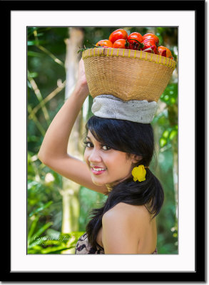 Dwie - carrying a basket full of tomatoes