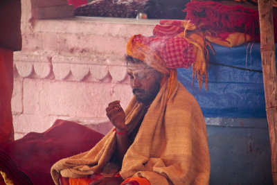 Varanasi Sadhu holy smoke.jpg