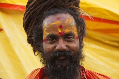 A sadhu in front of yellow 1.jpg