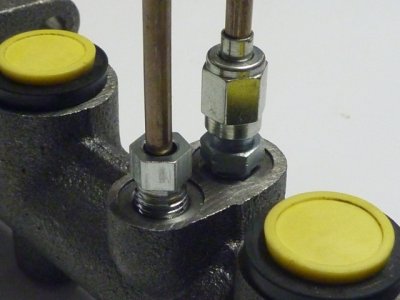 Metric tube nut vs AN to Metric adapter