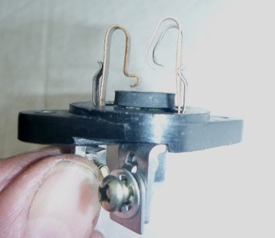 Washer glued in place as buffer