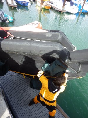 Wrestling the life raft into the water. 2014_10_17_ISAF_Survival _007.jpg