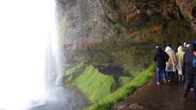 Seljalandsfoss drops 200 feet and a path leads behind the falls for wonderful damp fun. 2015_08_11_Iceland _3357.jpg