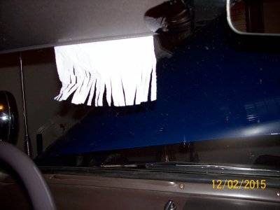 Paper flag reacting to defroster air.