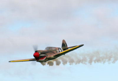 Damian's Curtiss P40 smokes through IMG_0131.jpg
