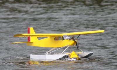 Jamie's boat struggling to push Bill's floatplane, 0T8A6853.jpg
