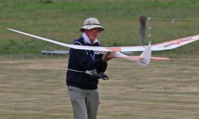 Bill Gilbert inspects his Bird of Time glider, 0T8A9319.jpg