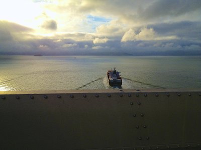 Ship Passing Under SF Bay Bridge