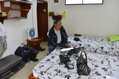 Lang upload pictures at Posada del Caminante hostal .Isabela Island