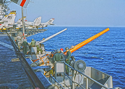 Marine's Gunnery practice with 5 inch 38s aboard USS Lexington