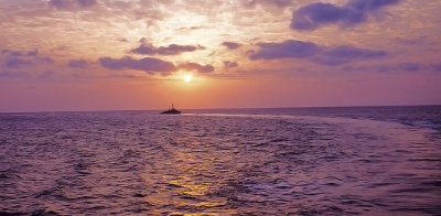Sunset with Destroyer Escort in our wake