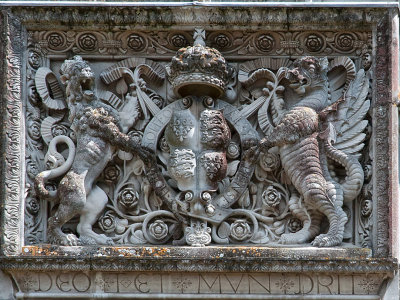 Above entrance to Hampton Court, King Henry's adopted motto, something like victory goes to the side most favored by god.