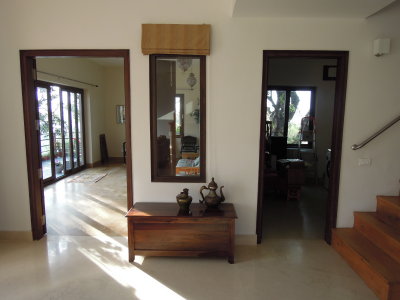 View of entrances to sunroom (left) and laundry room (right)