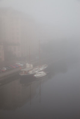 Boats in morning fog