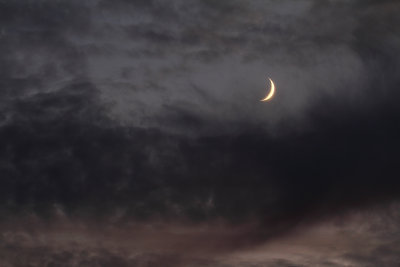 Crescent in the Clouds