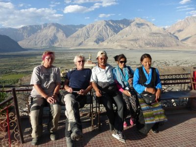 31 Chatting to a family from Tibet at the top of the monastry in Diskit.jpg