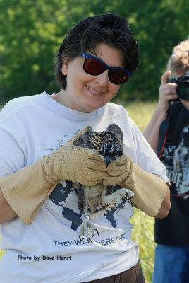 Monica Mc Pherson holds the chick for photo.