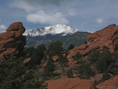 Pikes Peak framed by the red rocks of the Garden