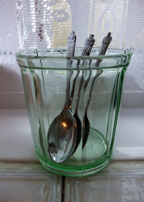 apostle spoons in green glass