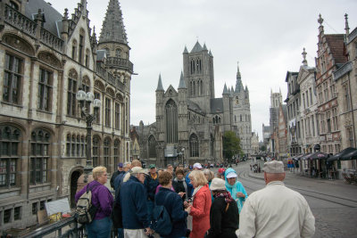 Walking tour of Ghent, Belgium, with Bavo Cathedral in the background.