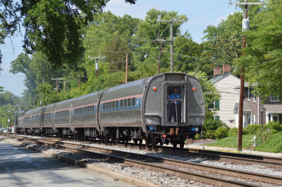 31 The Carolinian comes back south with a trainman maning the backup hose with its air whistle.jpg