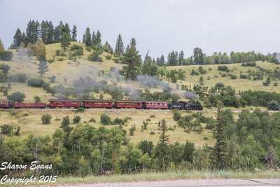 K36 489 takes the Sunset train up the grade away from Laboto