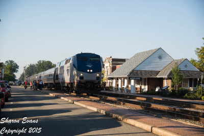Amtrak train 84 with P42 132 slows for Ashland as the passengers wait to board