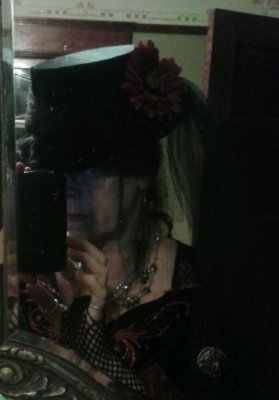 This is me wearing a hat that I made for Halloween 2014.