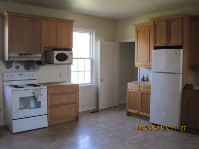 Photos of Kitchen with Oven/Fridge and Microwave