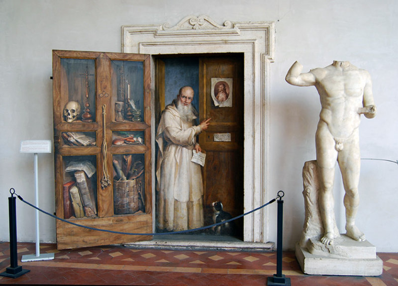 A Monk Appears in the Doorway to a Cell6679