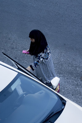 Israeli Arab woman with own car and phone this morning in Tel Aviv