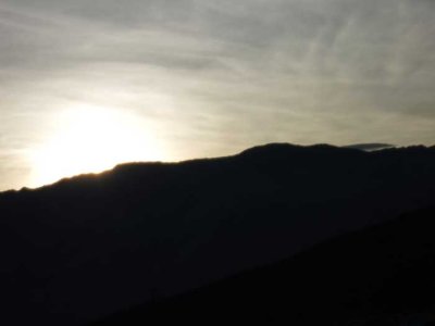Sun going behind the hills