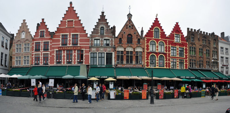 Row of terrace cafés on the north side of the Market Square of Bruges