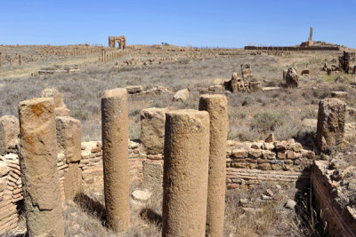 Ruins of Ancient Timgad with the prominent remains of the Capitol and Trajans Arch
