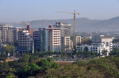 Newer construction to the north and west of the Abuja Hilton