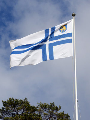 Club flag of the Ålandska Segelsallskapet with the colors of Finland, Mariehamn