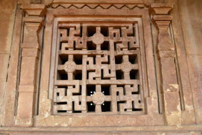 Stone screen with swastikas and crosses