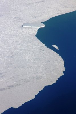 Iceberg trapped in sea ice