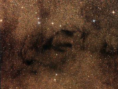 Les nbuleuses sombres Barnard 65, 66, 67