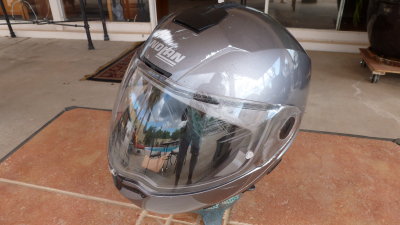 The helmet had modest abrasions all the way around, but didn't see any heavy impact site.