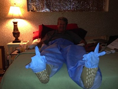 Paul and Lou's idea of humor....doing silly things to a guy that can't move!