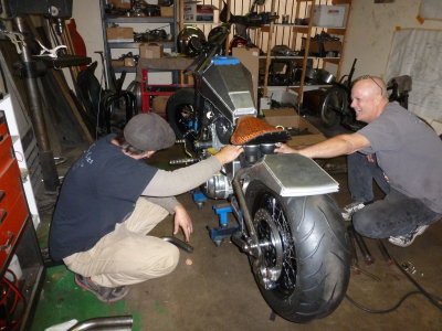 Out in back with my Bobber,  fabricator Phil on left - Bill, the owner, on right.