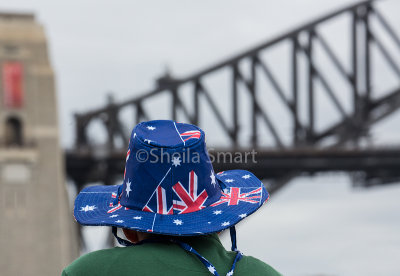 Aussie flag hat with Sydney Harbour Bridge backdrop on Australia Day