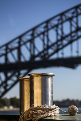 Bollard and Sydney Harbour Bridge backdrop