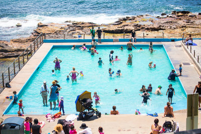 Rockpool with people at Dee Why