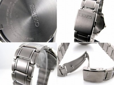 SEIKO SOLAR SNE141 SNE141P1 100M BLACK DIAL TITANIUM BAND