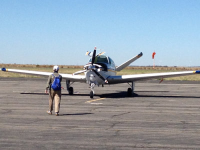 An IFR student returns to her airplane (me). Thanks to Lawrence for this picture.