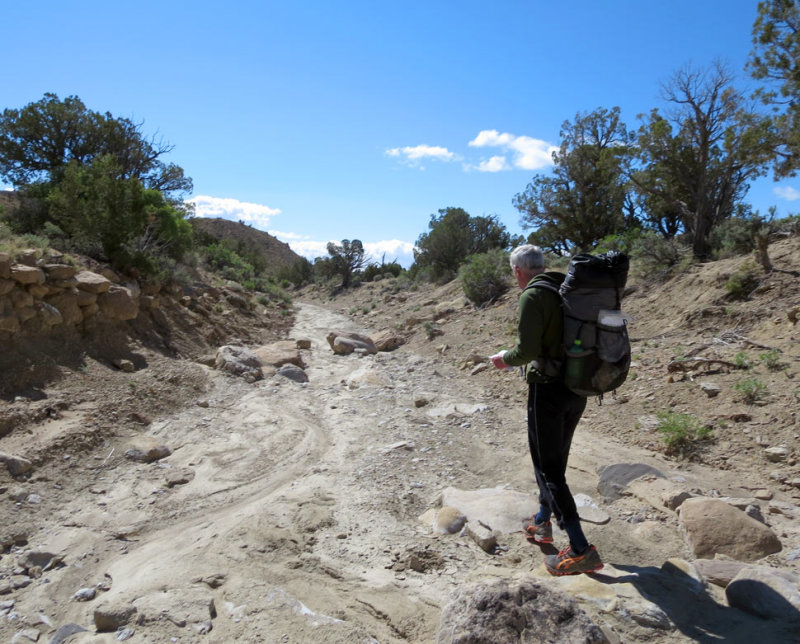Navigating down washes below the cliffs
